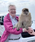 Speaker Jonathan Rice in Gibraltar with a Barbary ape